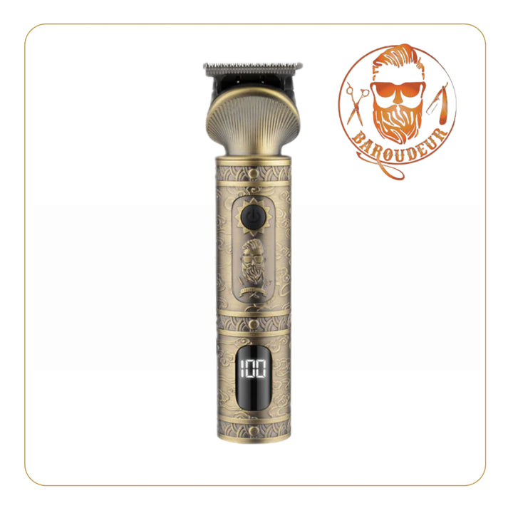 Little Balance Baroudeur clipper with vintage engraved design, LED display, copper housing, detachable 0.2 mm stainless steel blades, supplied with cutting guides and accessories, 1200 mAh Li-ion battery, corded or cordless use.